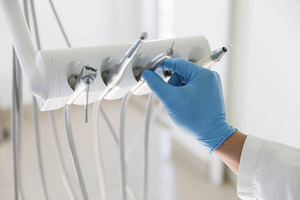 Professional Root Canal Treatment technician working in Angleton, TX